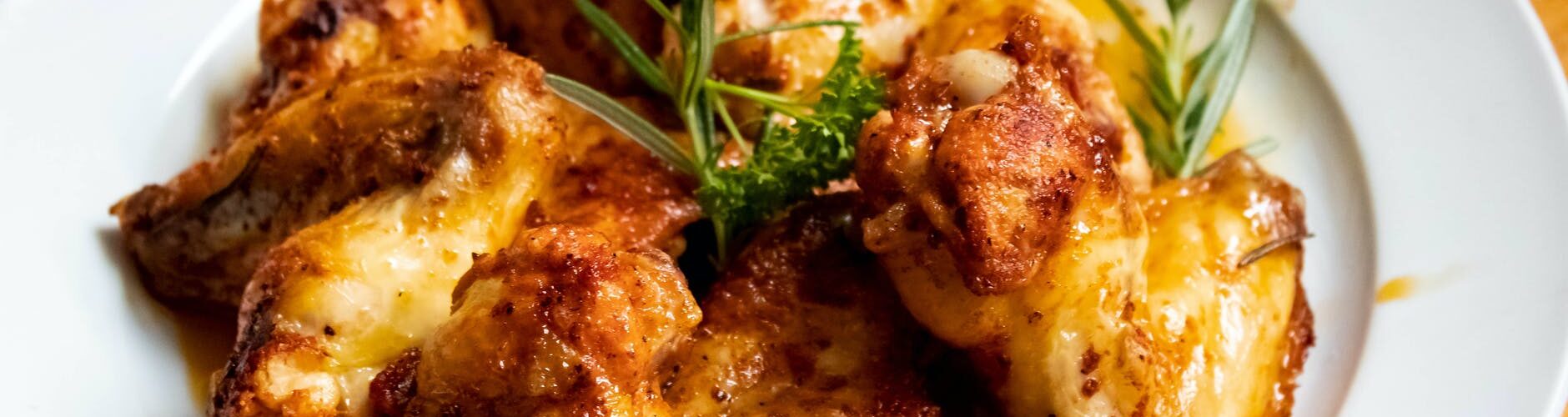 fried meat on white plate