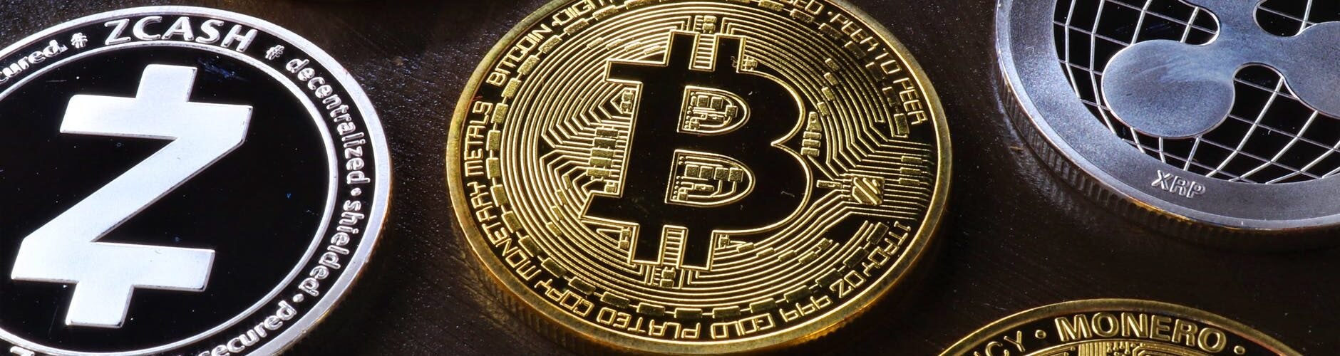various cryptocurrency on table