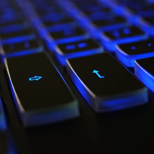 closeup photo of black and blue keyboard
