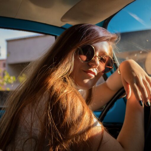 unknown celebrity taking selfie inside vehicle
