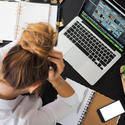 woman sitting in front of computer