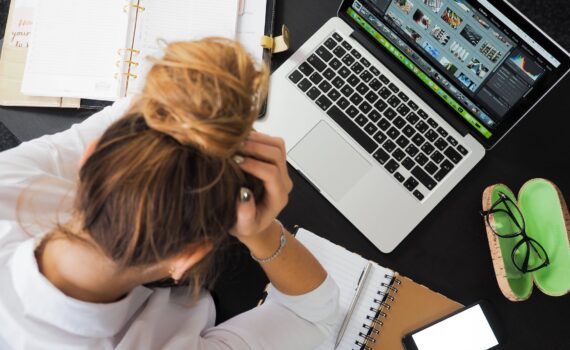 woman sitting in front of computer