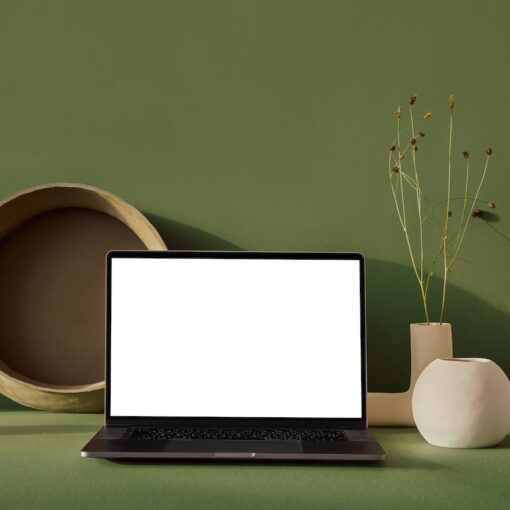 laptop with blank screen placed on table