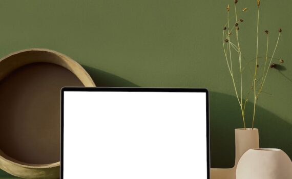 laptop with blank screen placed on table