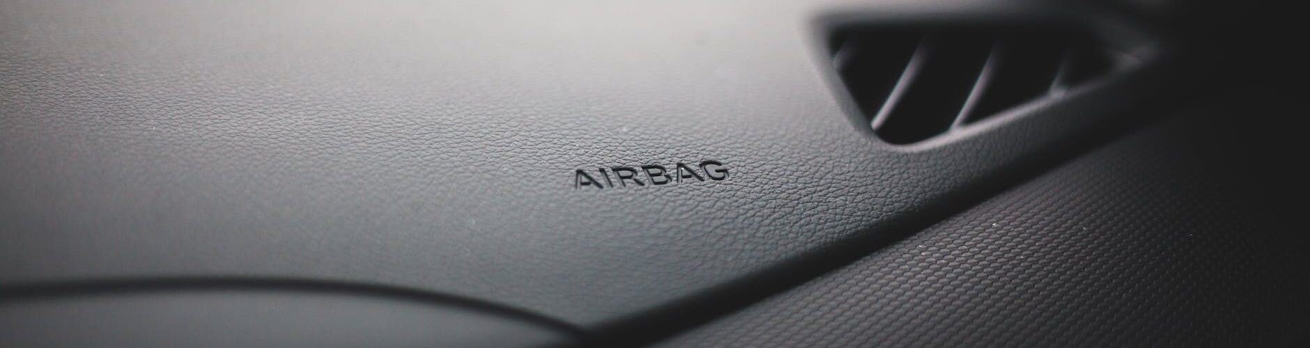 black car air vent and airbag
