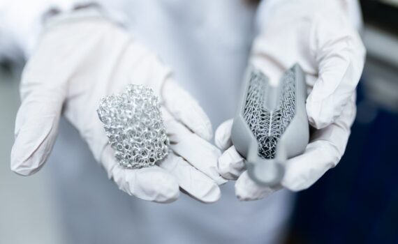 engineer holding clean energy battery