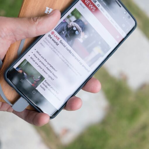 person holding black samsung android smartphone