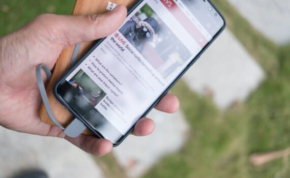 person holding black samsung android smartphone