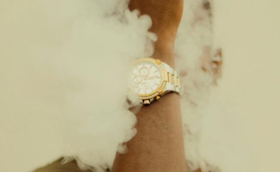 man with his face covered in smoke