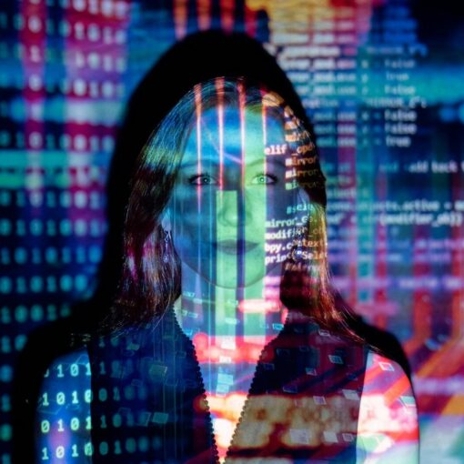 code projected over woman