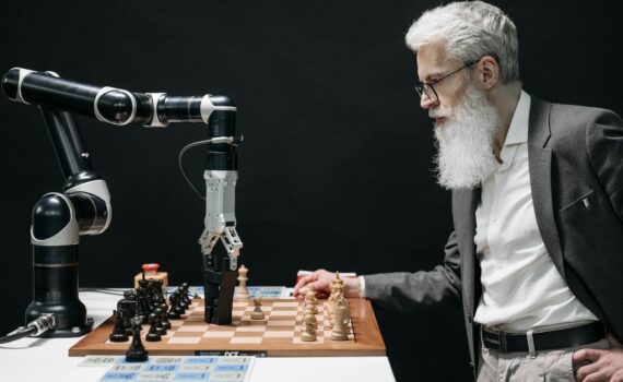 a bearded man playing chess