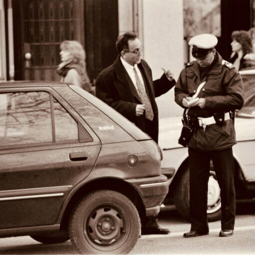police officer writing a parking ticket