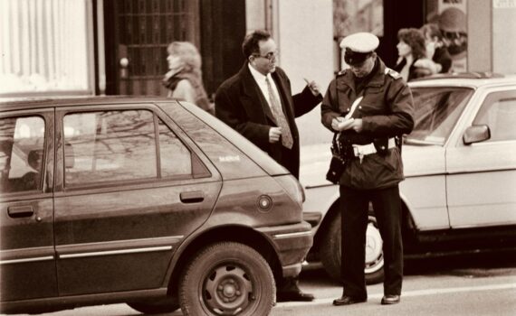 police officer writing a parking ticket