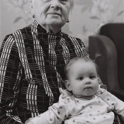 grandma holding baby on her lap